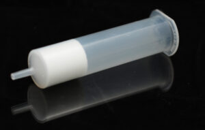 Filled solid phase extraction cartridge